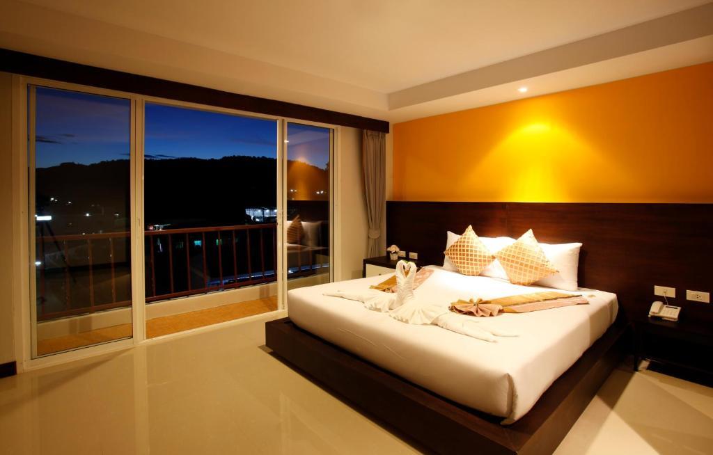 Nize Hotel - Sha Plus Phuket Quarto foto